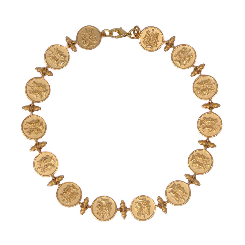 janus gold necklace