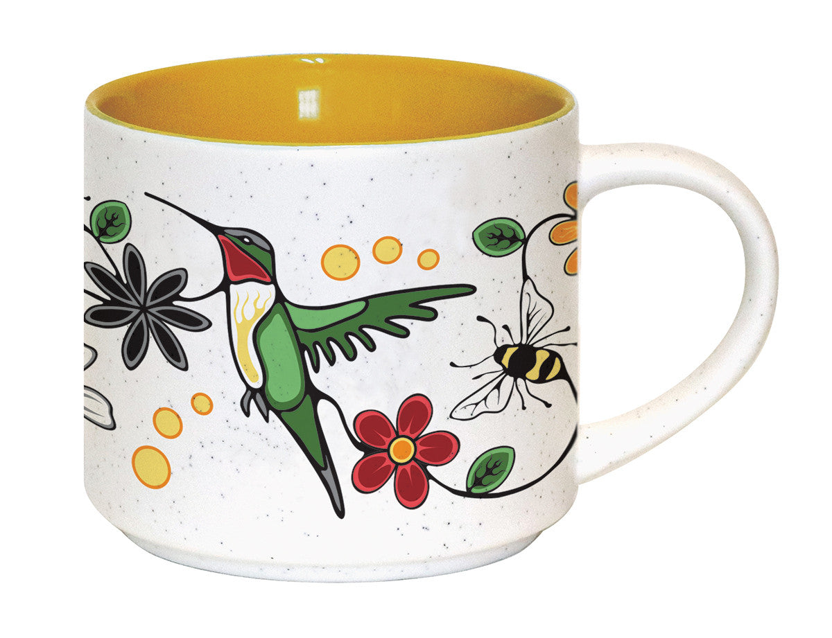 Ceramic mug with Native Northwest artwork of hummingbird, flowers and bee.