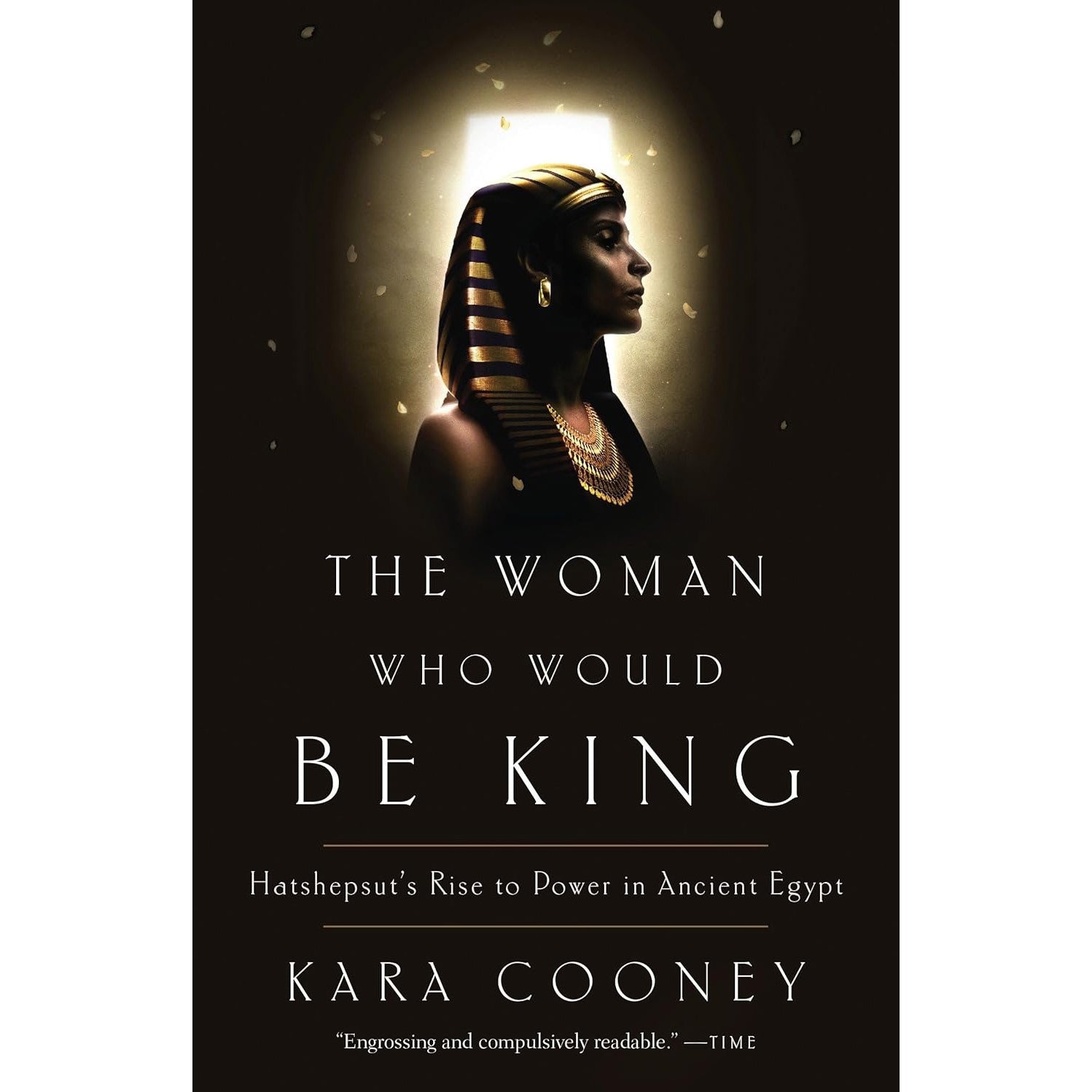 Cover of the book "The Woman Who Would be King: Hatshepsut's Rise to Power in Ancient Egypt" with the author's name (Kara Cooney) and a blurb "Engrossing and compulsively readable" from TIME under the title. Features an image of a woman's head and shoulders in Pharaoh's headdress with a halo of light surrounding her.