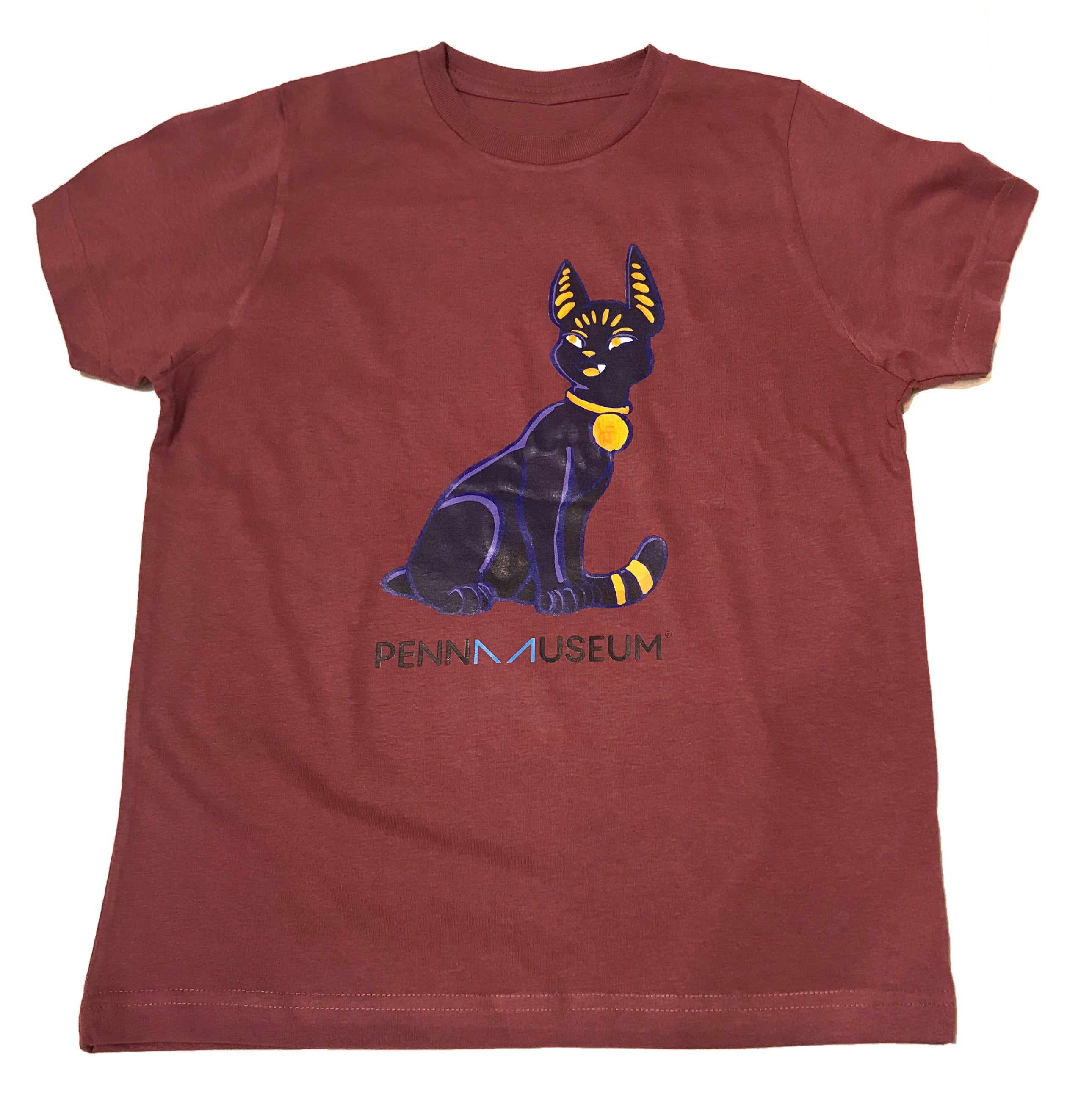 Youth-sized maroon t-shirt with an illustration of a Bastet cat on the front, and the text 'Penn Museum' below it.