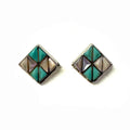 Pair of geometric earrings with turquoise and silver design on a white background