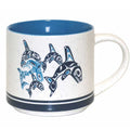Ceramic mug with Native Northwest artwork of a family of orca whales.