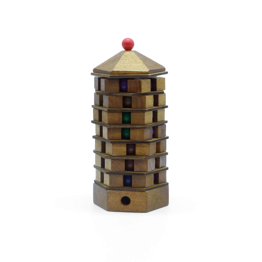 Wooden puzzle tower with colorful beads on a white background