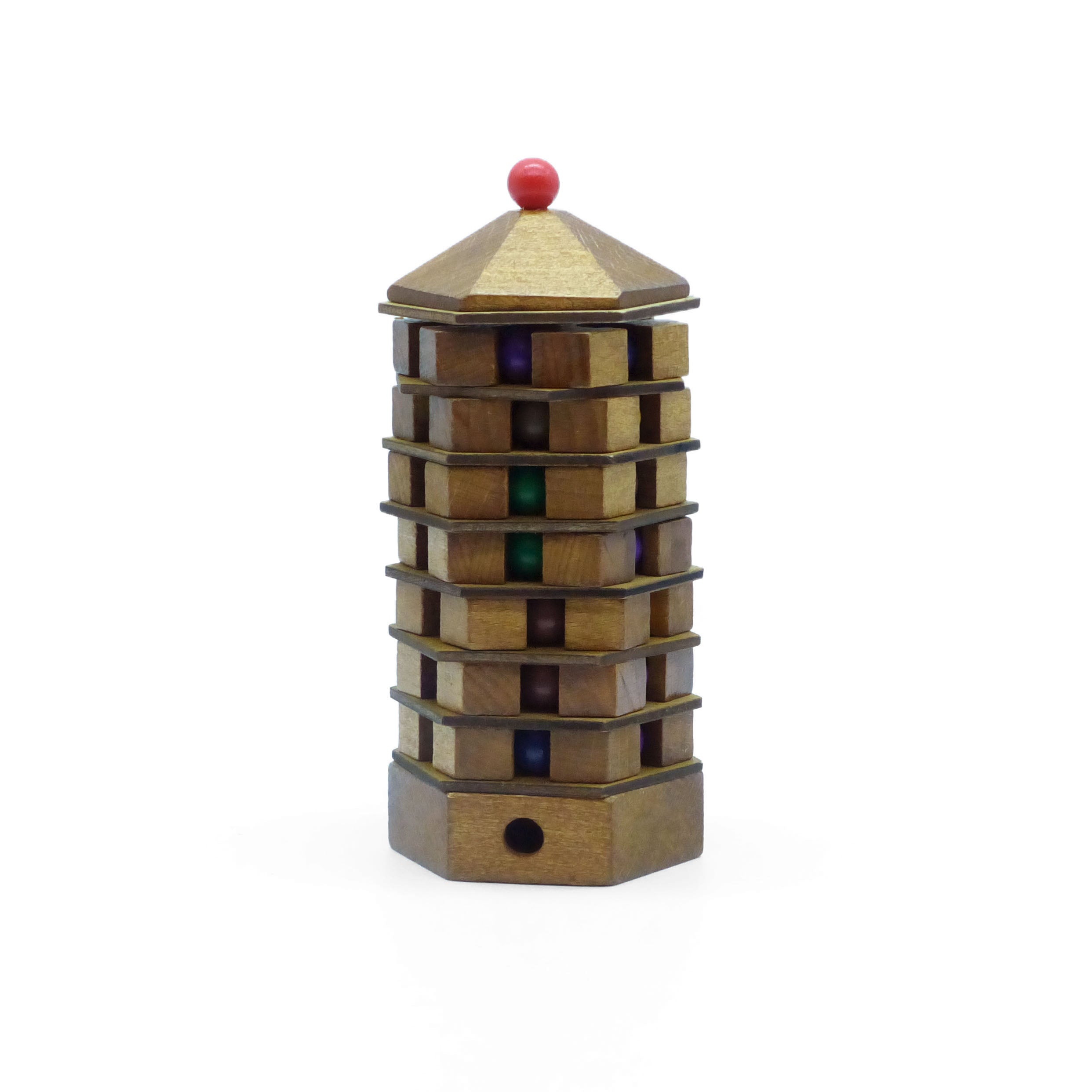 Wooden puzzle tower with colorful beads on a white background