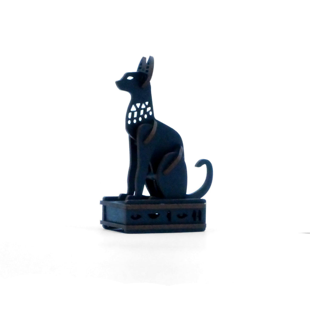 An assembled Ancient Egyptian themed 3-d puzzle of an Egyptian Bastet cat.