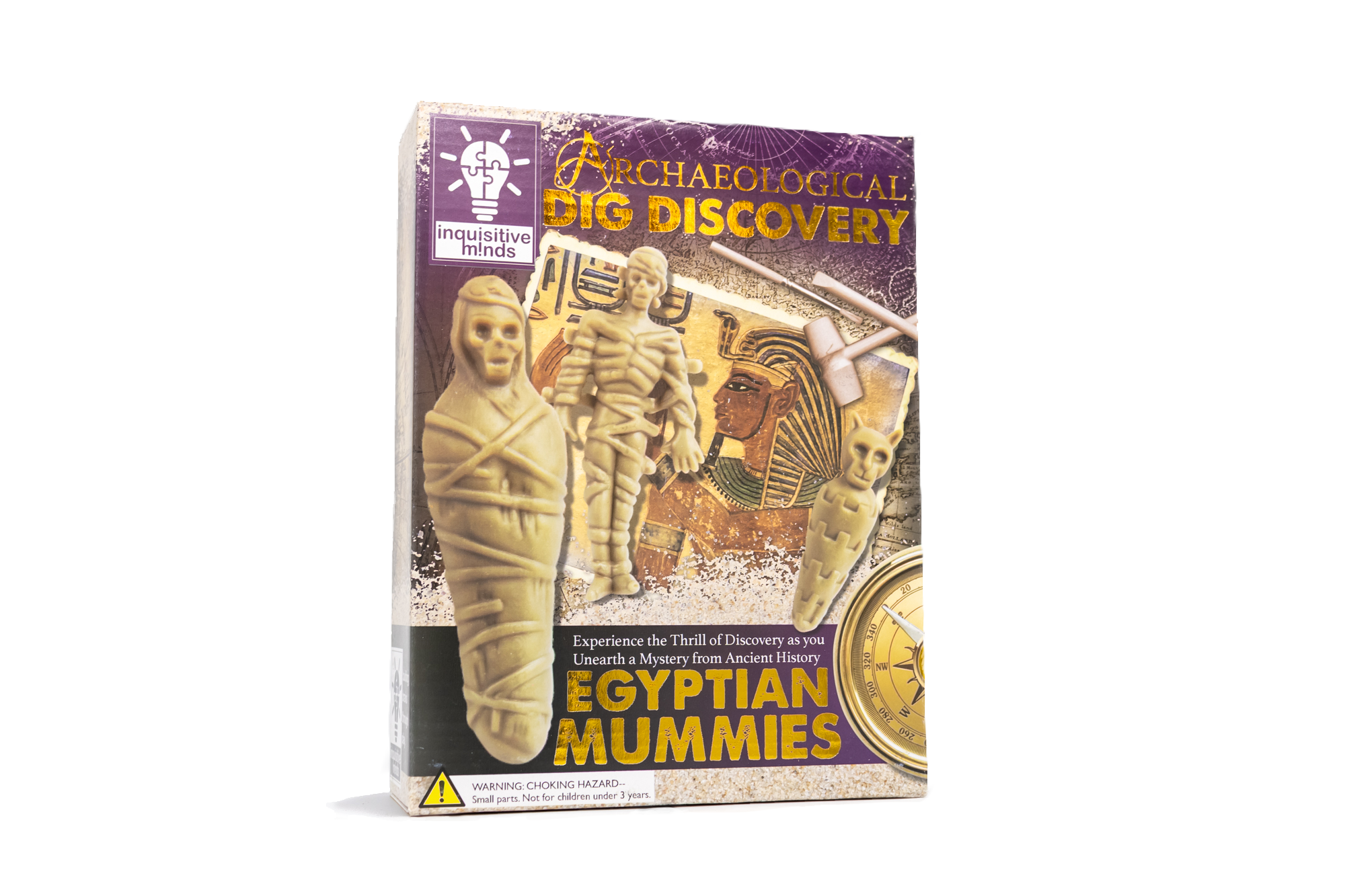 Purple box with text "Archaeological Dig Discovery, Experience the Thrill of Discovery as you Unearth a Mystery from Ancient History, Egyptian Mummies", toy mummy, and the kit's tools. 