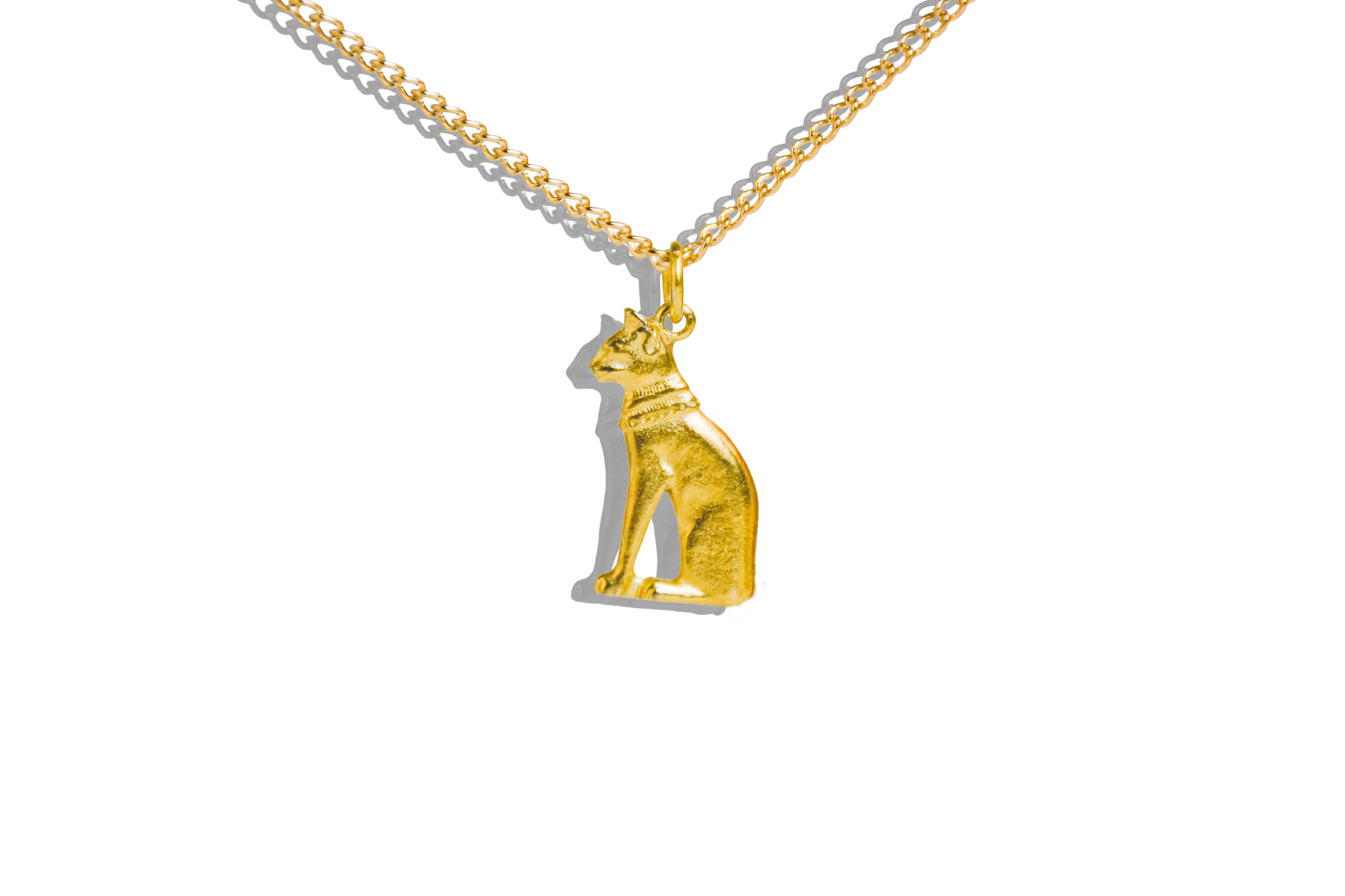Gold cat-shaped pendant on a chain against a white background