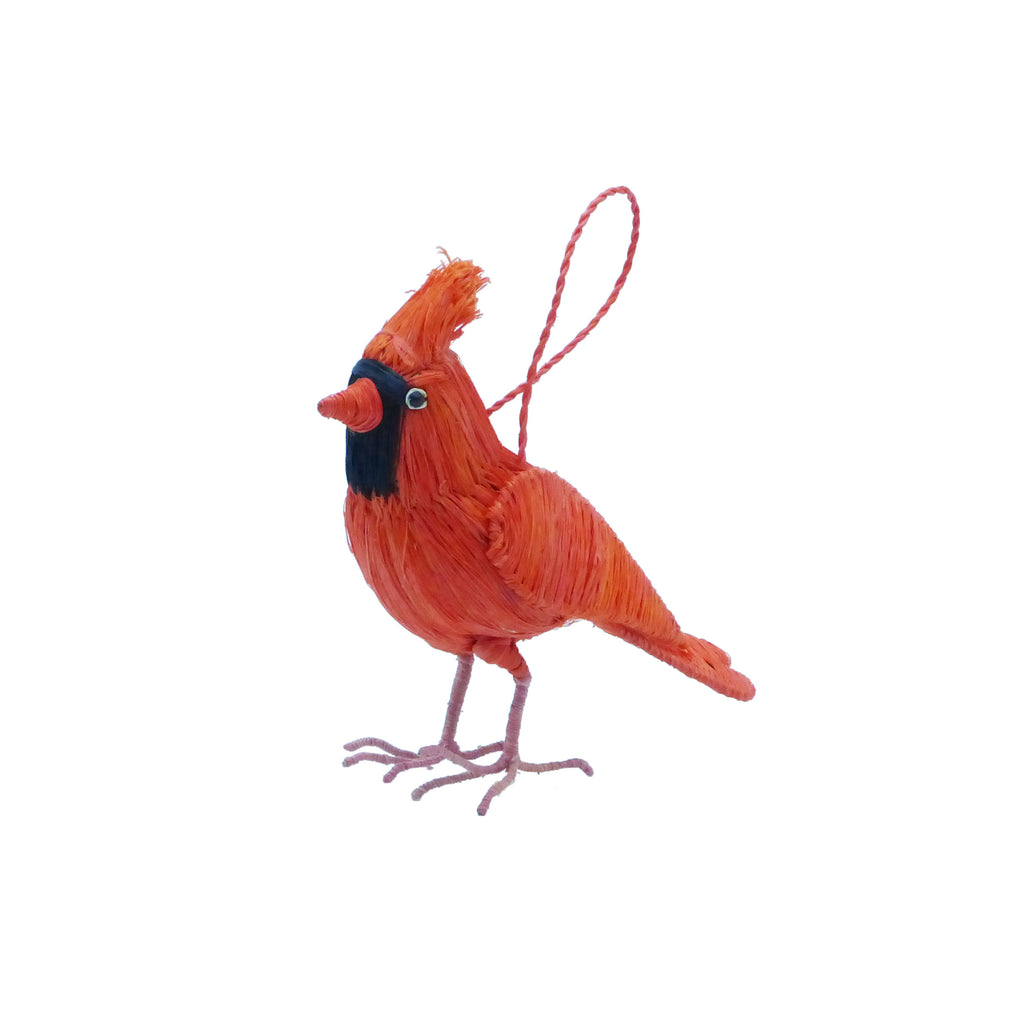 Red cardinal bird ornament on a white background