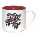 Ceramic mug with Native Northwest artwork of a symbol called running raven.